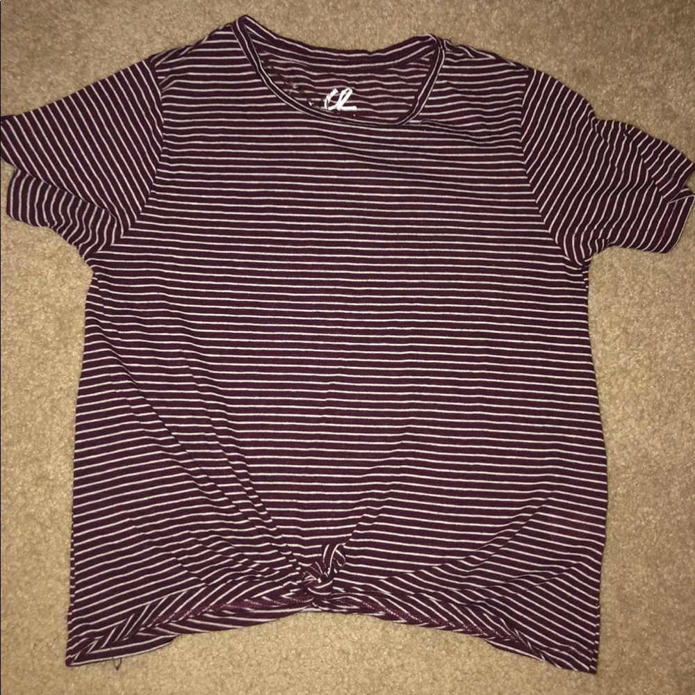 maroon and white stripped shirt.